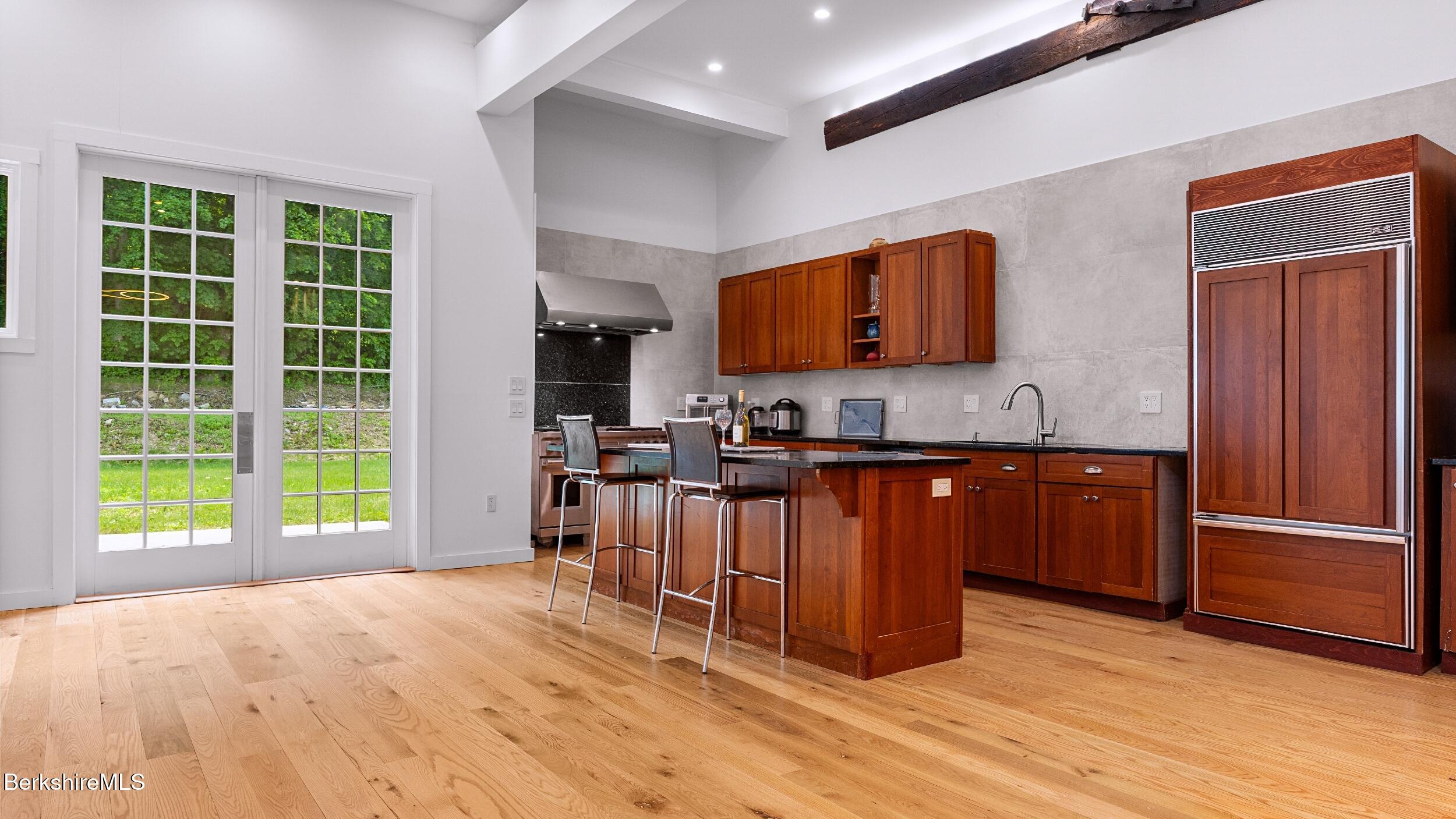 160 High Street Lee, MA 01238 - Photo 6 of 68 a kitchen with stainless steel appliances granite countertop a refrigerator and a sink