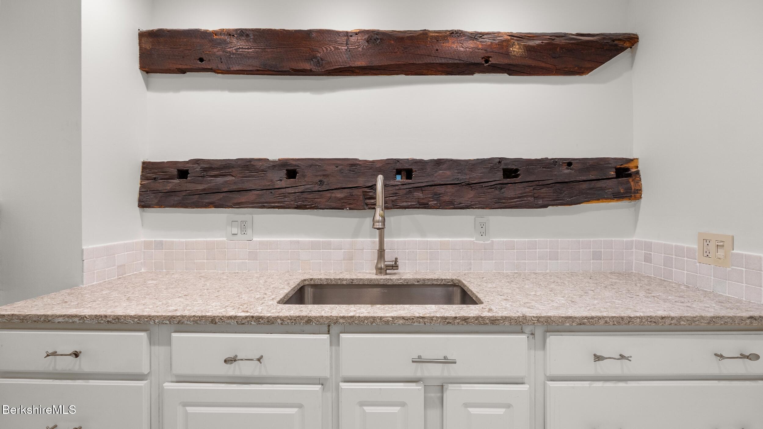 160 High Street Lee, MA 01238 - Photo 61 of 68 a kitchen with a sink and cabinets