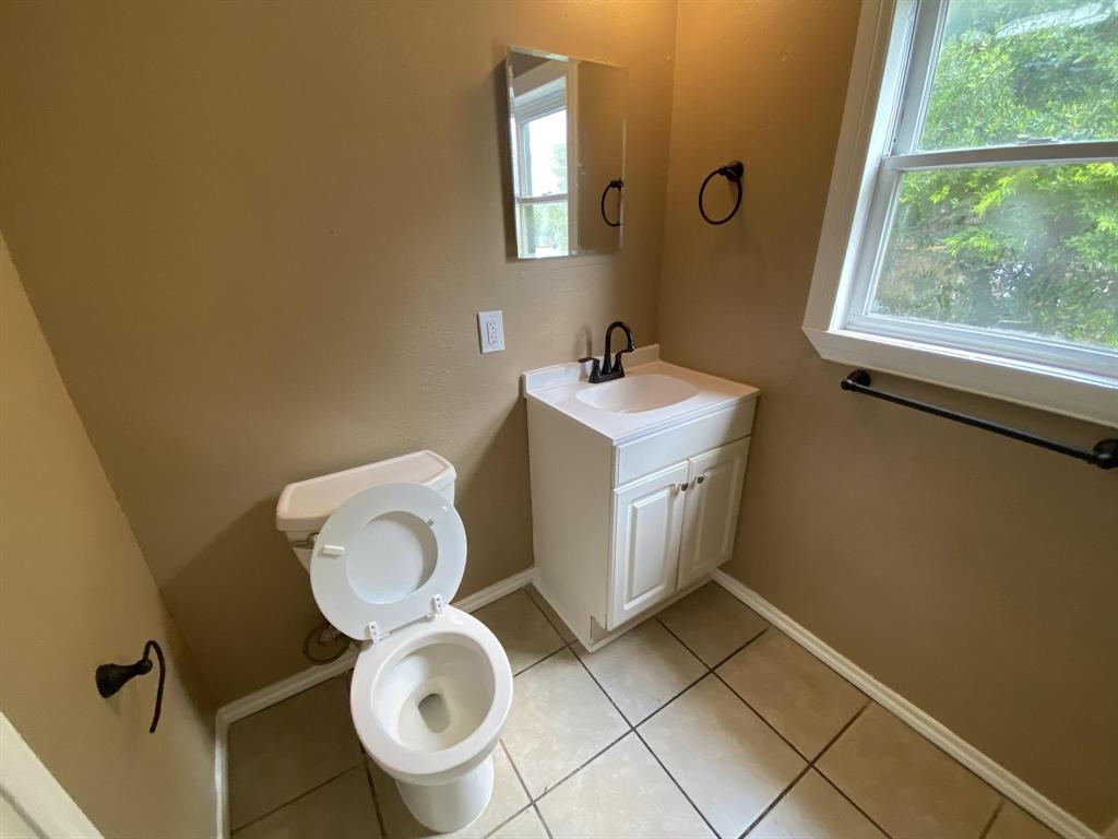 625 York Street, Unit B Athens, TX 75751 - Photo 15 of 15 Bathroom with vanity and light tile patterned floors