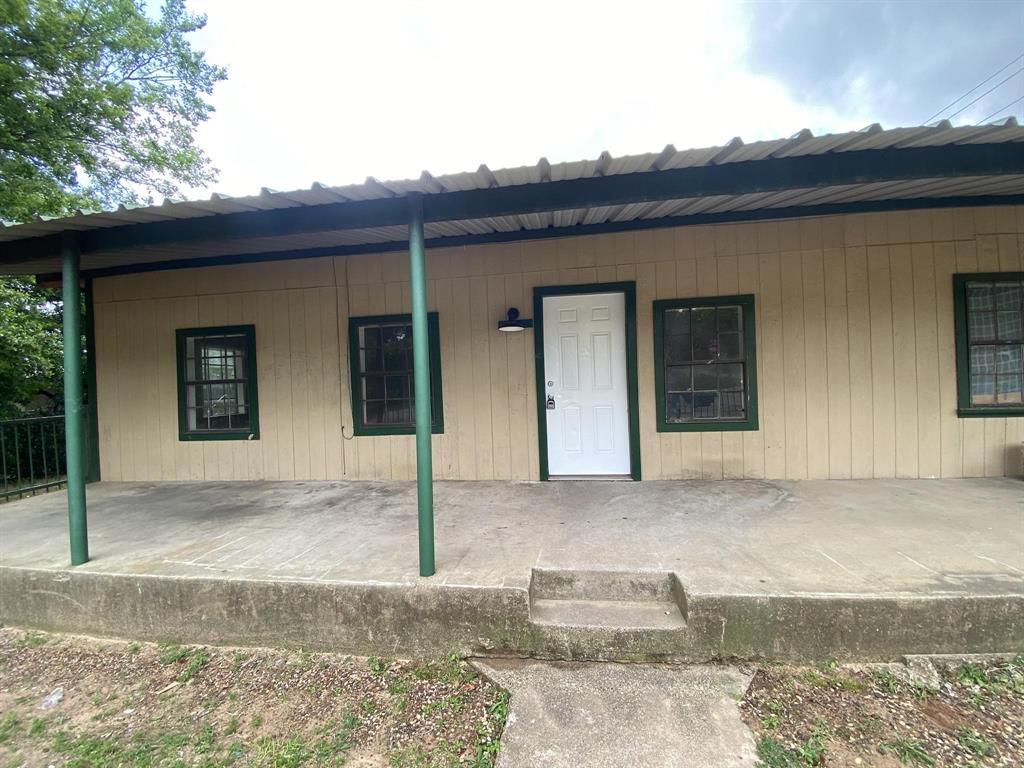 625 York Street, Unit B Athens, TX 75751 - Photo 2 of 15 Doorway to property with covered porch