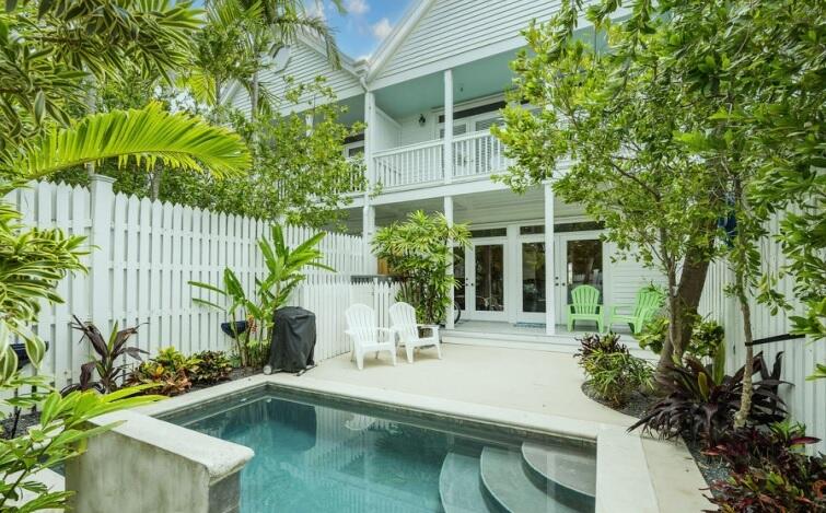 809 Washington Street, Unit 102 Key West, FL 33040 - Photo 33 of 33 a view of house with swimming pool and sitting area