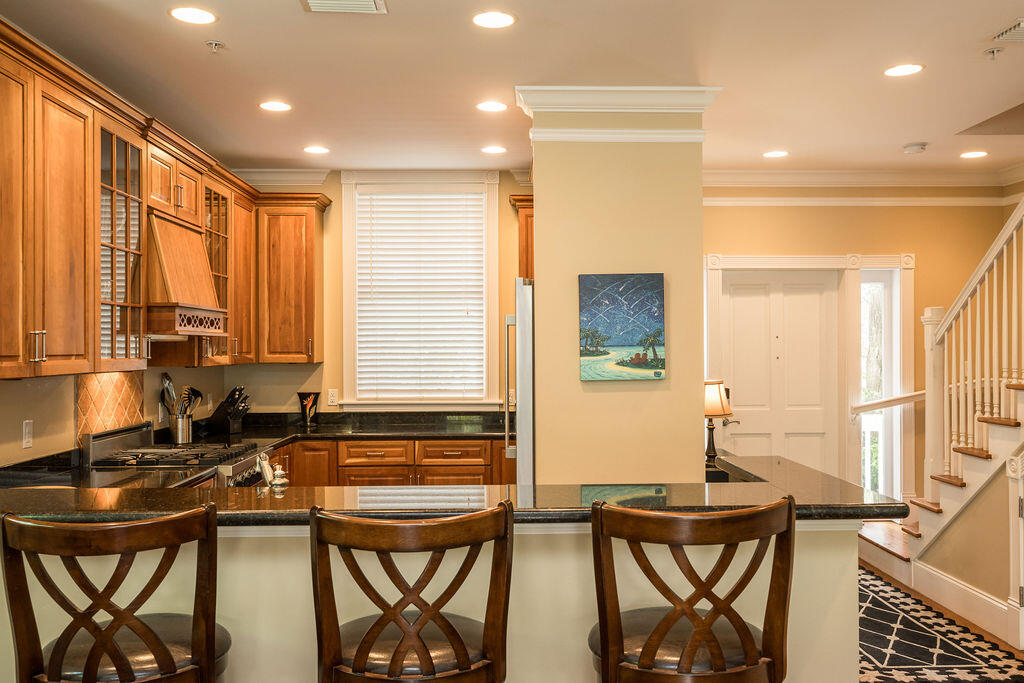 809 Washington Street, Unit 102 Key West, FL 33040 - Photo 6 of 33 a view of a a dining room with furniture window and outside view