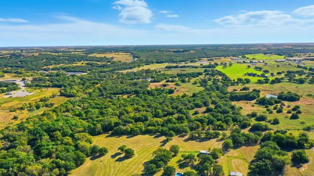 a view of a lake from a yard