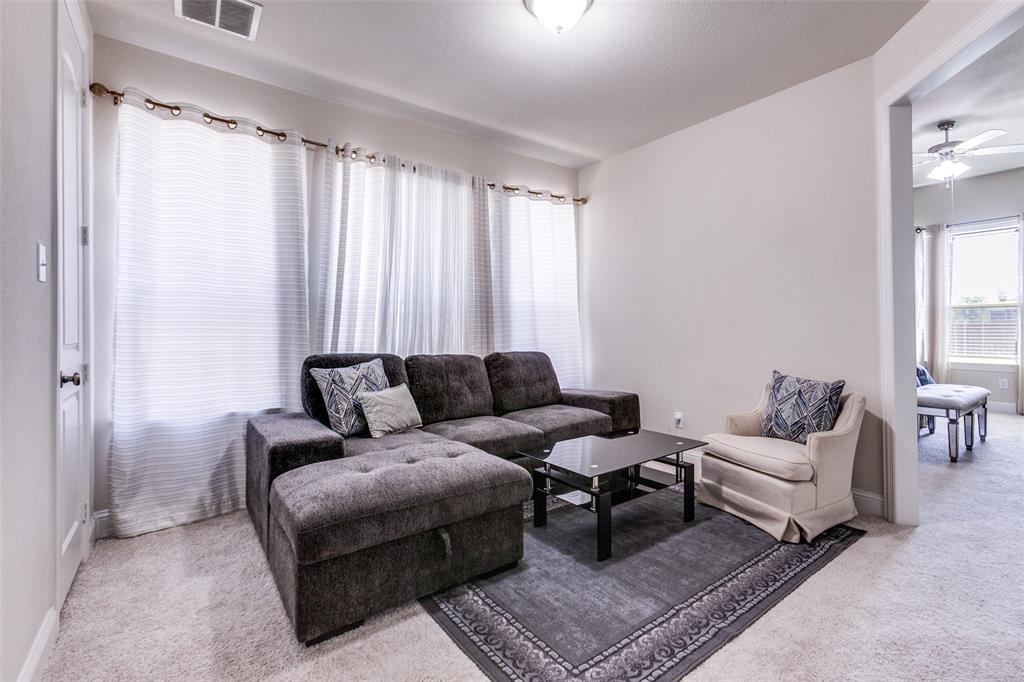3620 Acropolis Way Plano, TX 75074 - Photo 14 of 25 a living room with furniture and a rug