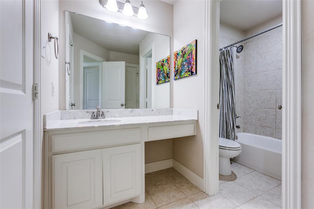 3620 Acropolis Way Plano, TX 75074 - Photo 17 of 25 a bathroom with a sink a toilet and shower