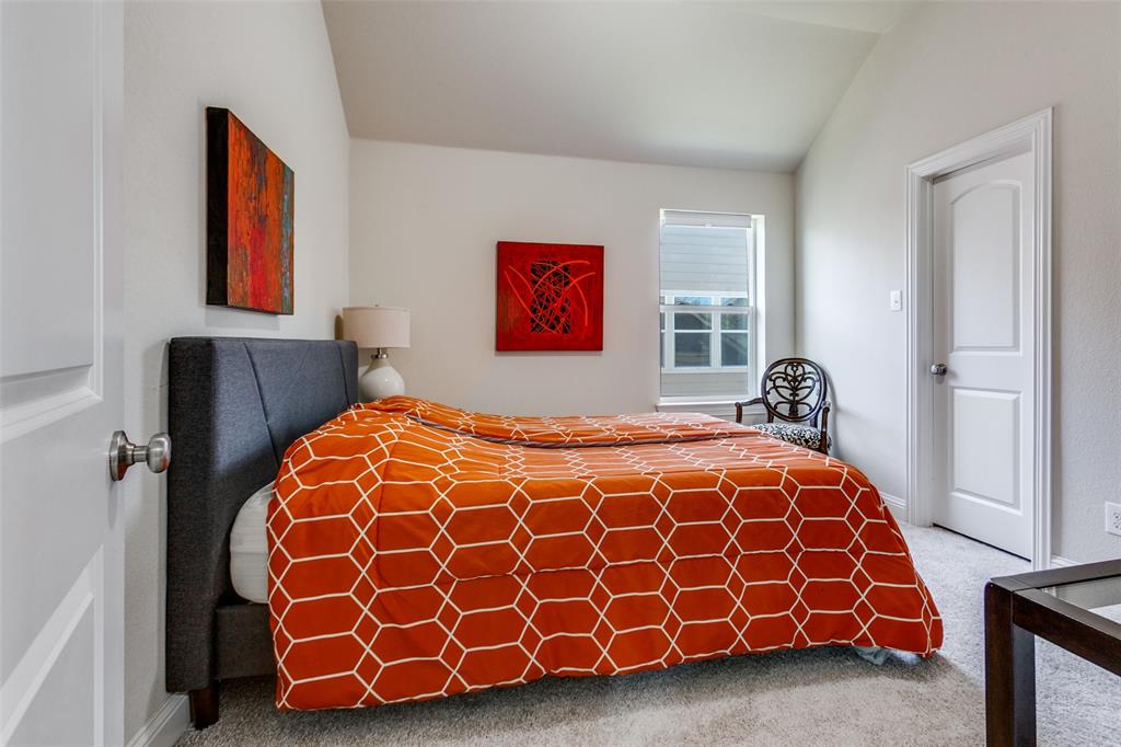 3620 Acropolis Way Plano, TX 75074 - Photo 18 of 25 a spacious bedroom with a bed and a window