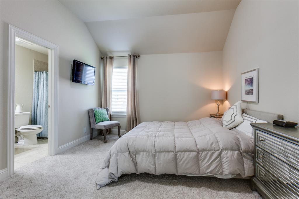 3620 Acropolis Way Plano, TX 75074 - Photo 20 of 25 a bedroom with a bed and a couch