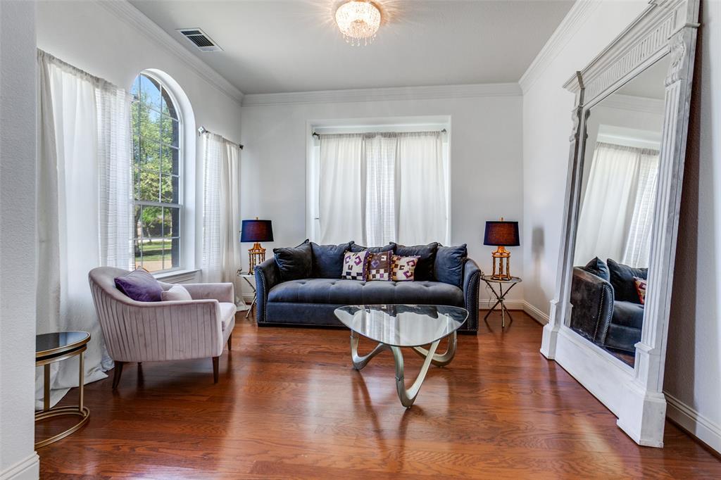 3620 Acropolis Way Plano, TX 75074 - Photo 3 of 25 a living room with furniture and a wooden floor