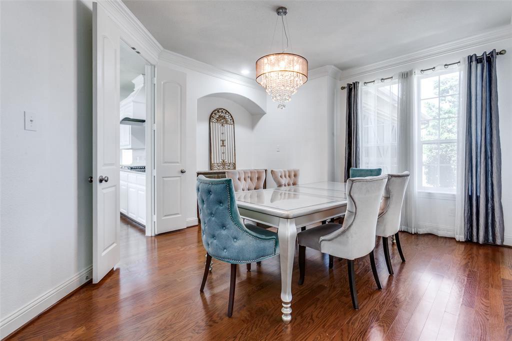 3620 Acropolis Way Plano, TX 75074 - Photo 4 of 25 a view of a dining room with furniture window and wooden floor