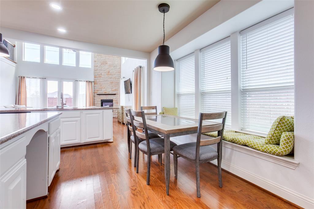 3620 Acropolis Way Plano, TX 75074 - Photo 6 of 25 a dining room with furniture and wooden floor