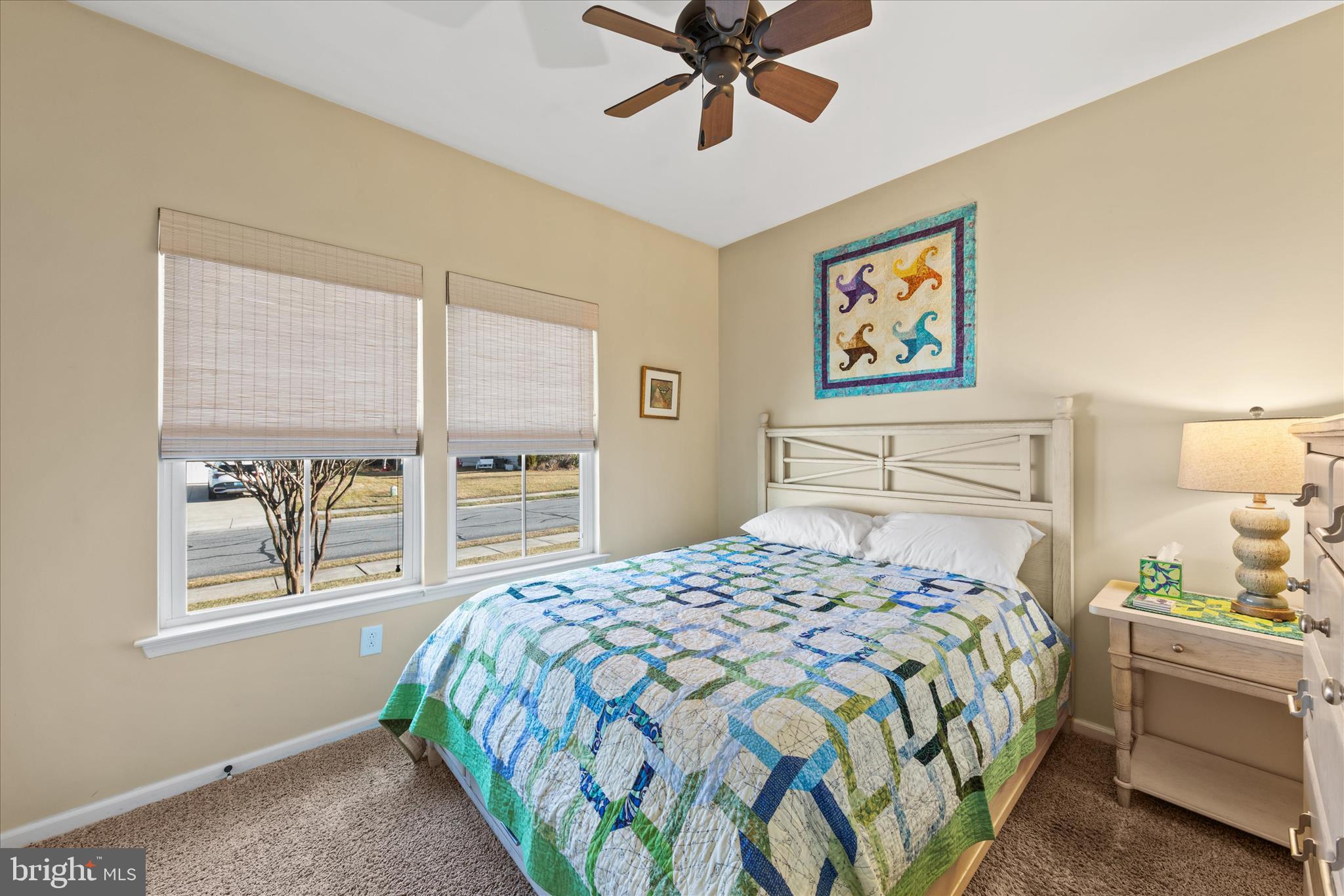 21329 North Acorn Way Lewes, DE 19958 - Photo 23 of 68 a bedroom with a bed and a window