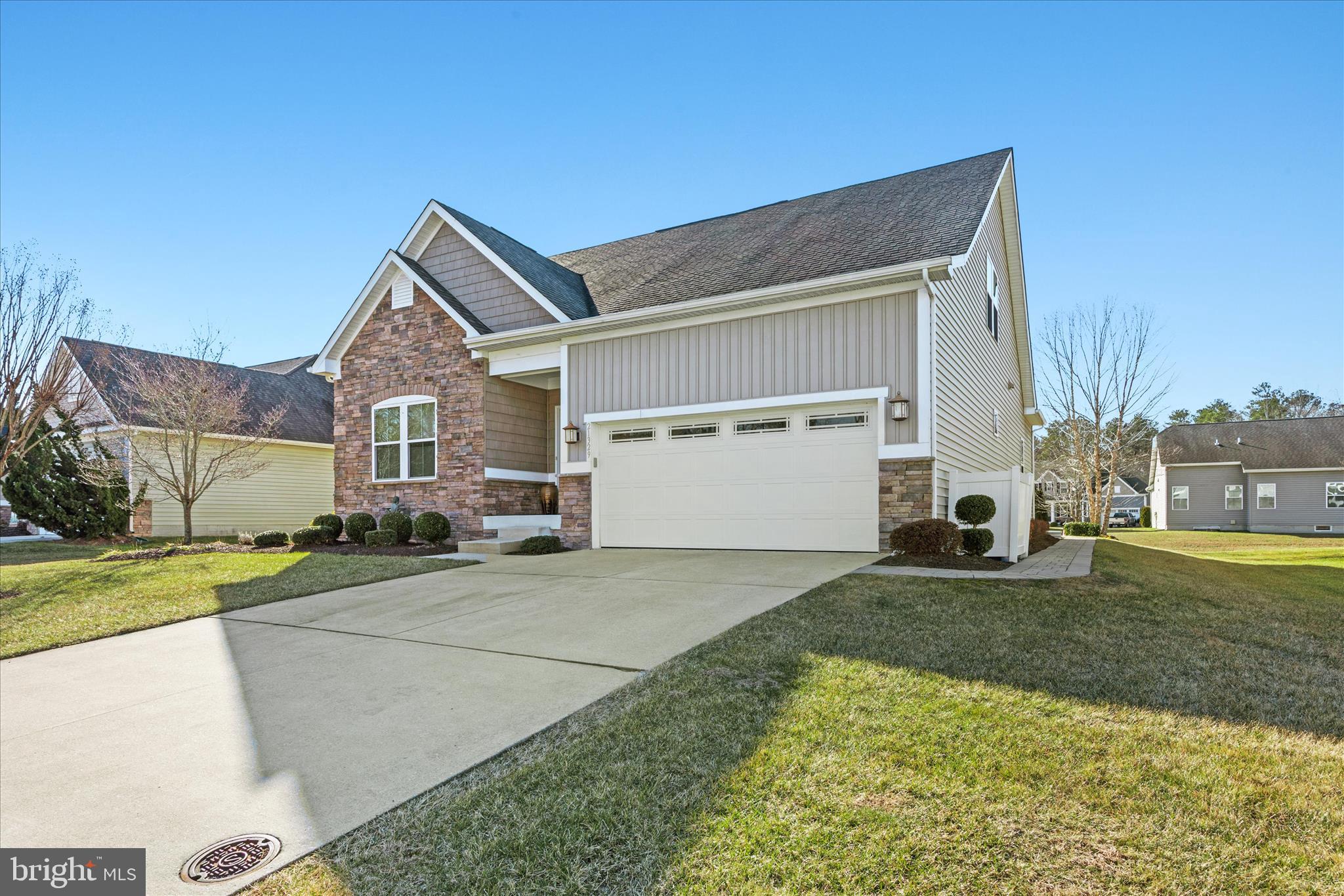 21329 North Acorn Way Lewes, DE 19958 - Photo 3 of 68 a view of a house with a yard