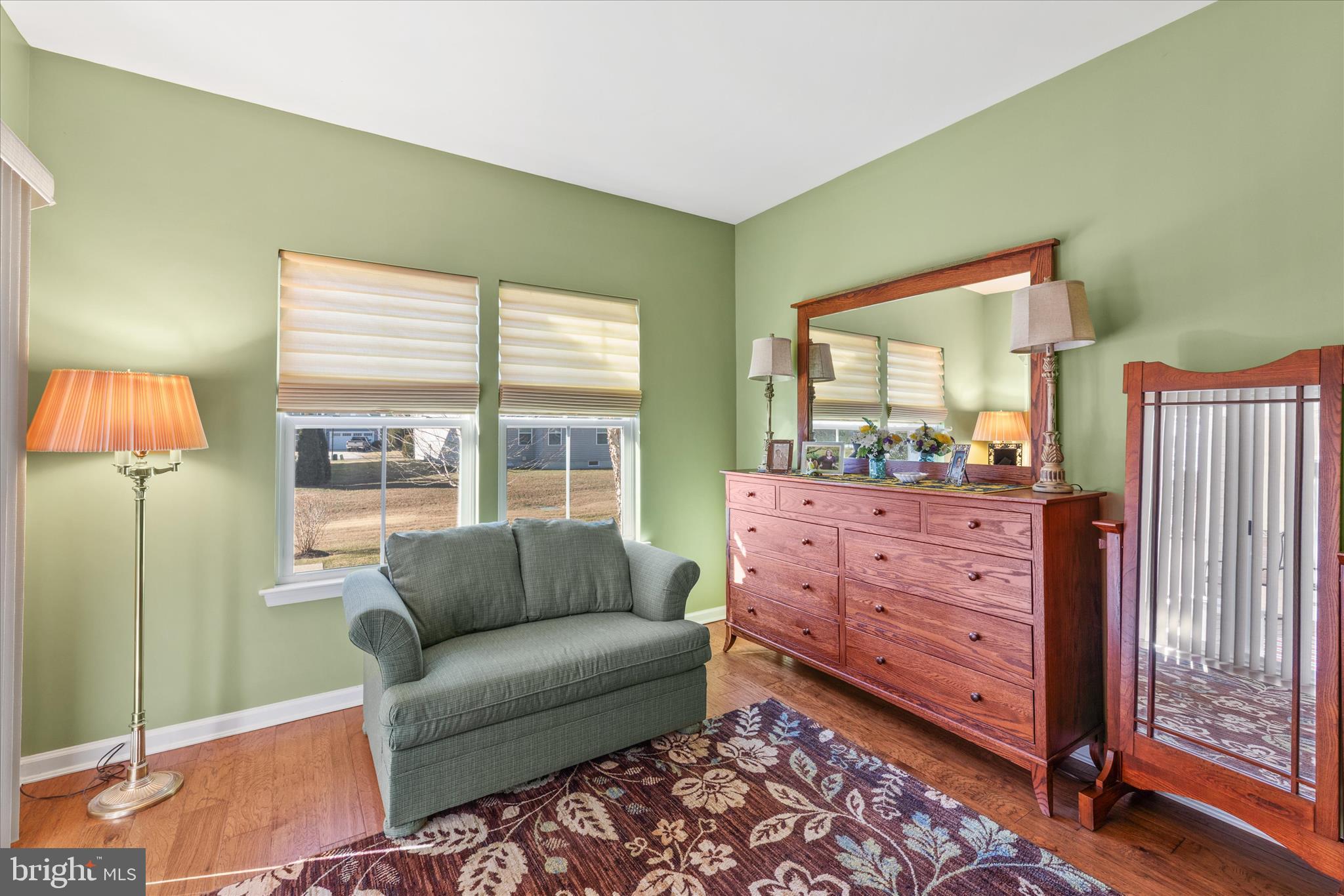 21329 North Acorn Way Lewes, DE 19958 - Photo 31 of 68 a living room with furniture and a large window