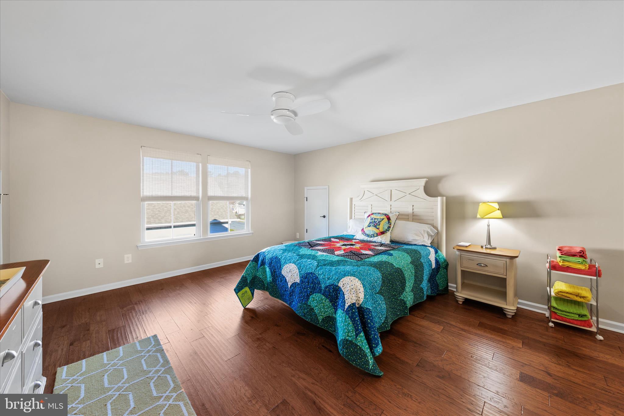 21329 North Acorn Way Lewes, DE 19958 - Photo 38 of 68 a bedroom with a bed and a window