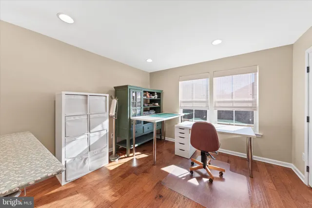 a backyard of a house with wooden floor outdoor seating and view living room