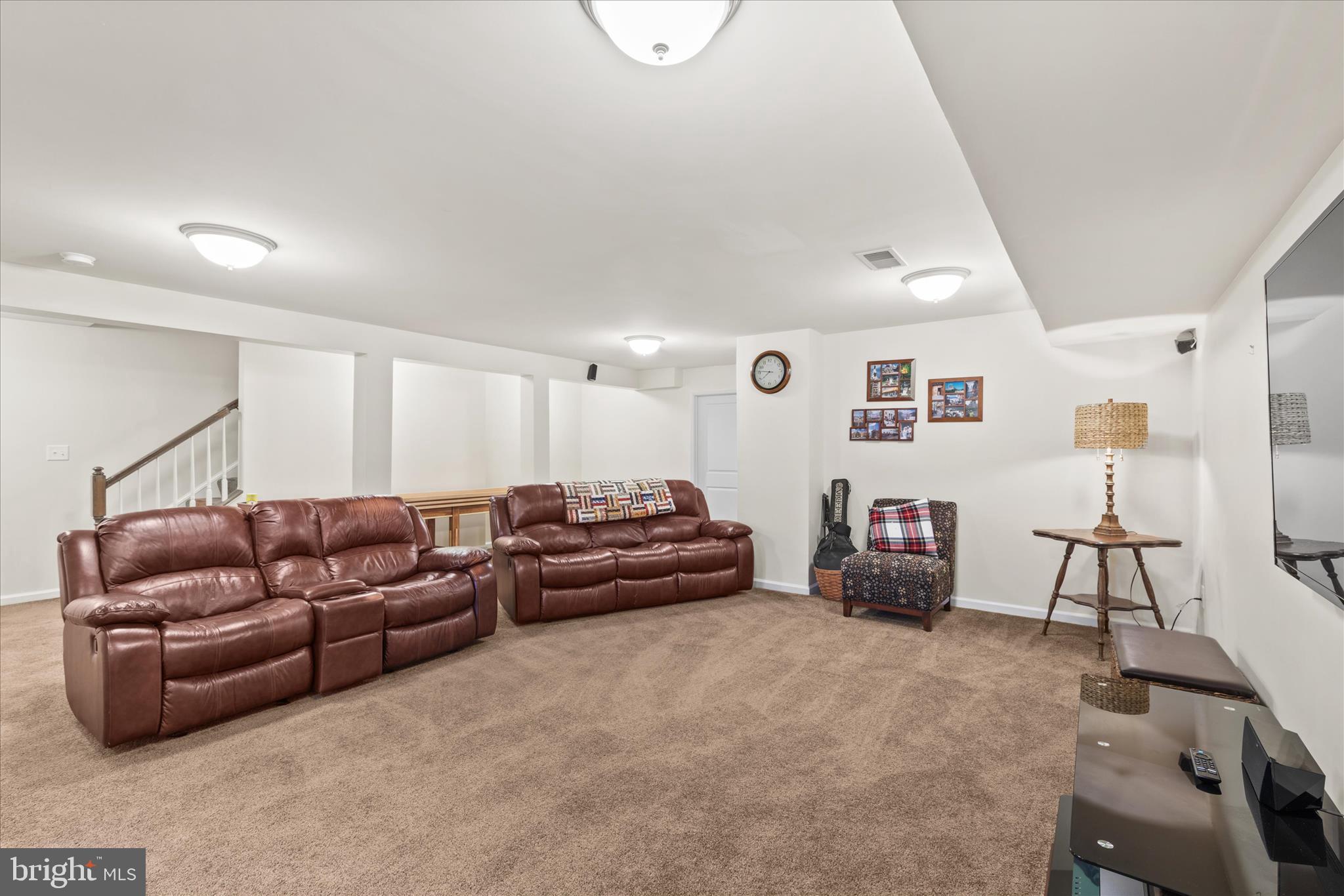 21329 North Acorn Way Lewes, DE 19958 - Photo 55 of 68 a living room with furniture and a couch