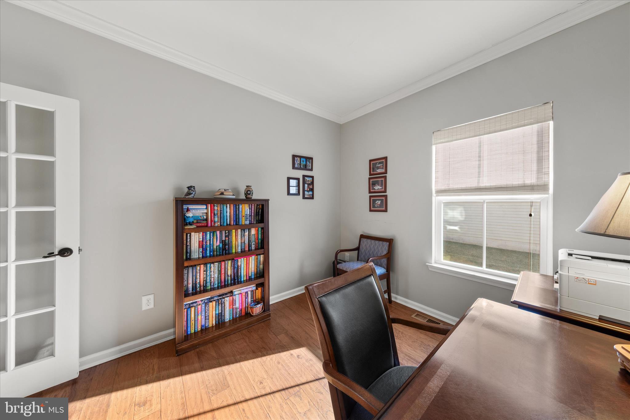 21329 North Acorn Way Lewes, DE 19958 - Photo 10 of 68 a view of a livingroom with furniture and a window