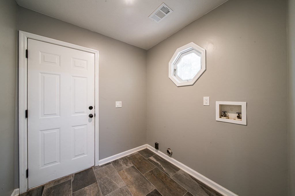 39 West Scotch Drive Fortson, GA 31808 - Photo 12 of 34 an empty room with closet and mirror