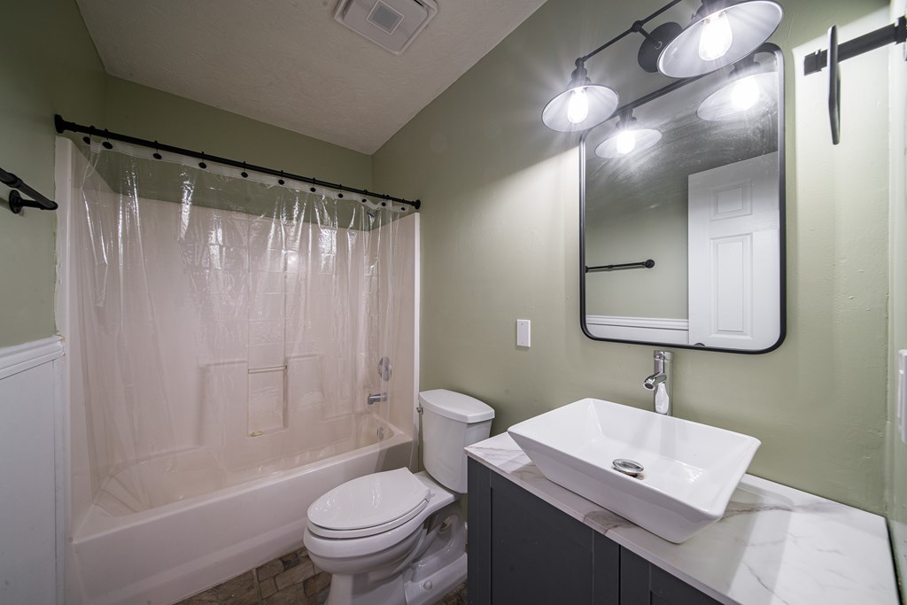 39 West Scotch Drive Fortson, GA 31808 - Photo 17 of 34 a bathroom with a granite countertop sink toilet and shower