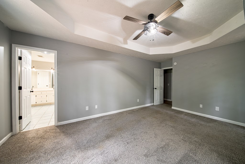 39 West Scotch Drive Fortson, GA 31808 - Photo 21 of 34 wooden floor in an empty room and a ceiling fan