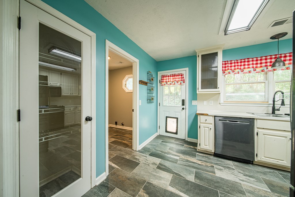 39 West Scotch Drive Fortson, GA 31808 - Photo 7 of 34 a kitchen with stainless steel appliances granite countertop a refrigerator and a sink