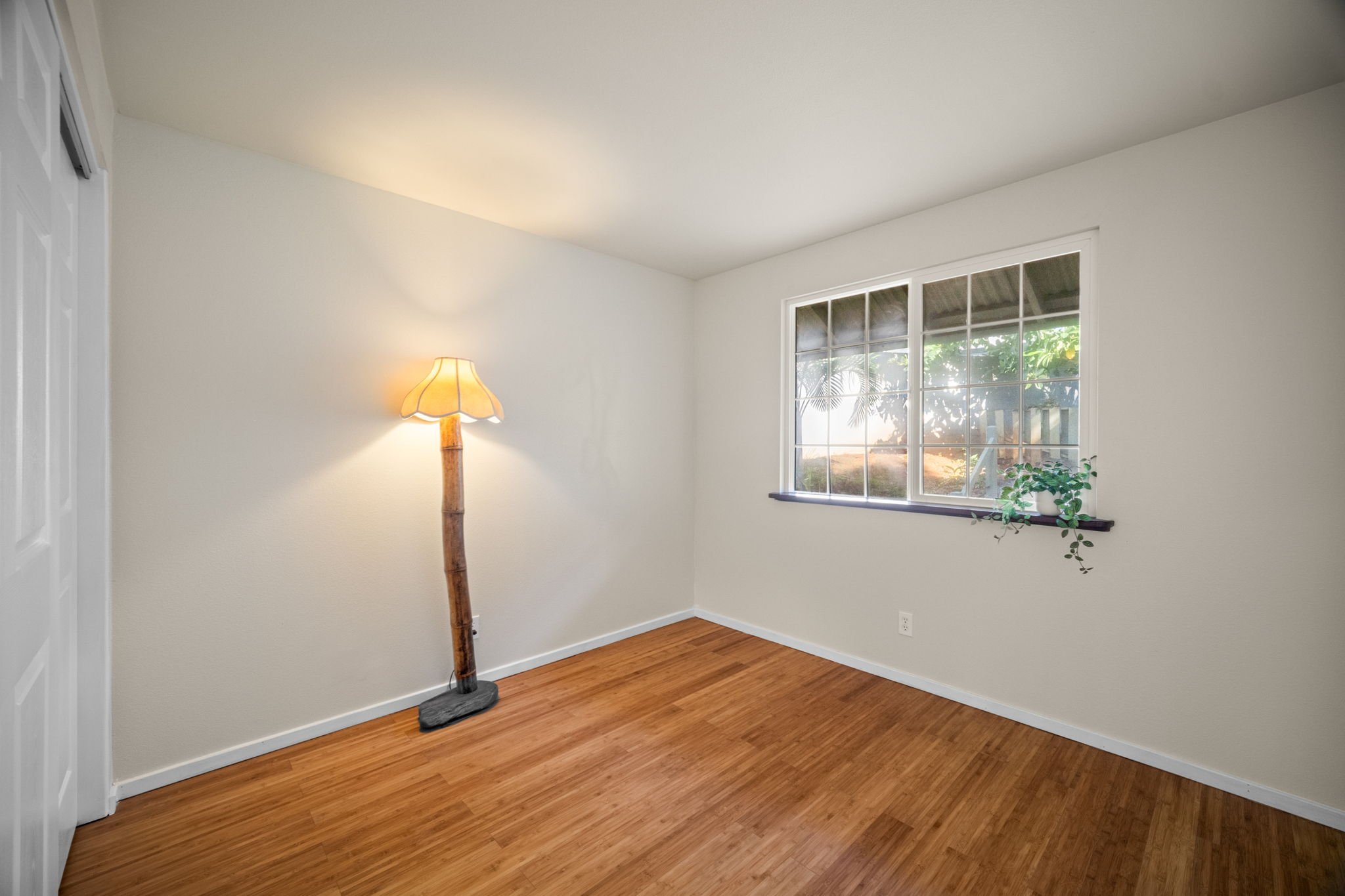 6050 C Kapahi Road Kapaa, HI 96746 - Photo 12 of 30 a view of empty room with wooden floor