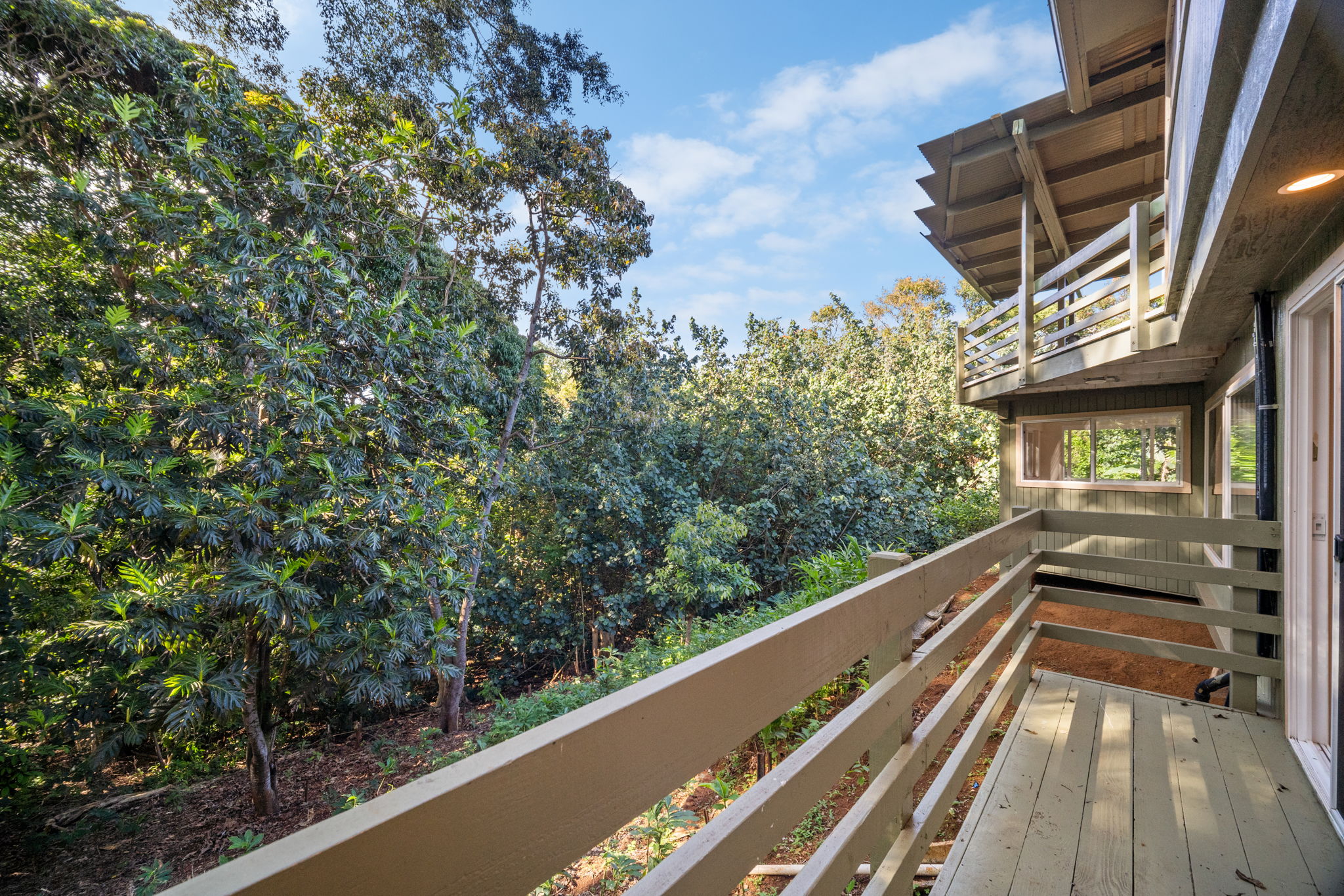 6050 C Kapahi Road Kapaa, HI 96746 - Photo 24 of 30 a view of balcony with wooden floor and fence