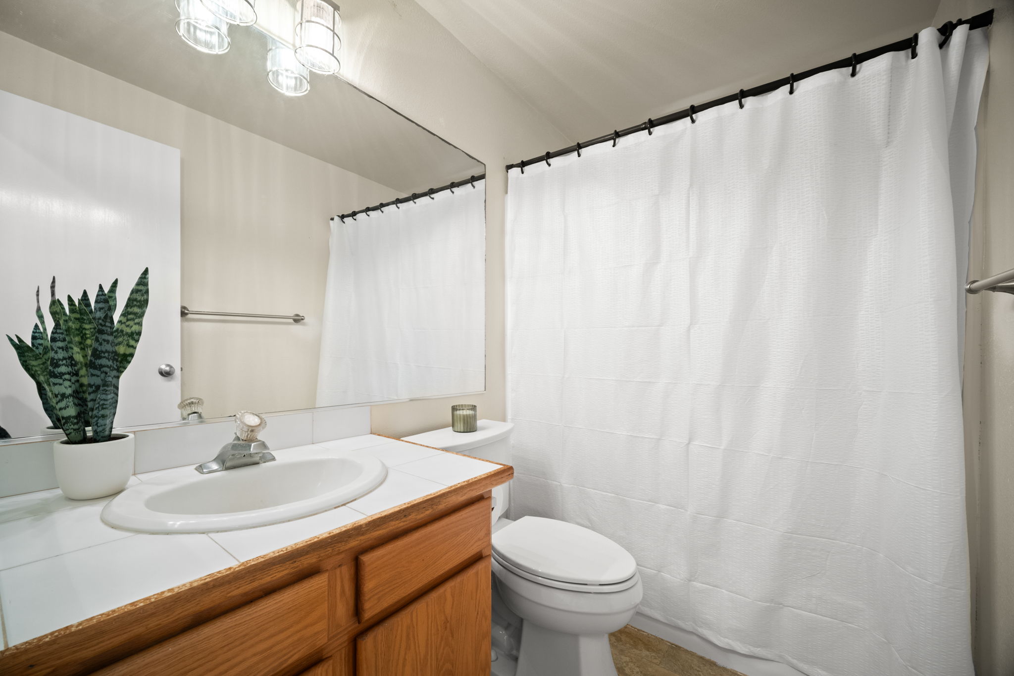 6050 C Kapahi Road Kapaa, HI 96746 - Photo 9 of 30 a bathroom with a sink and a mirror
