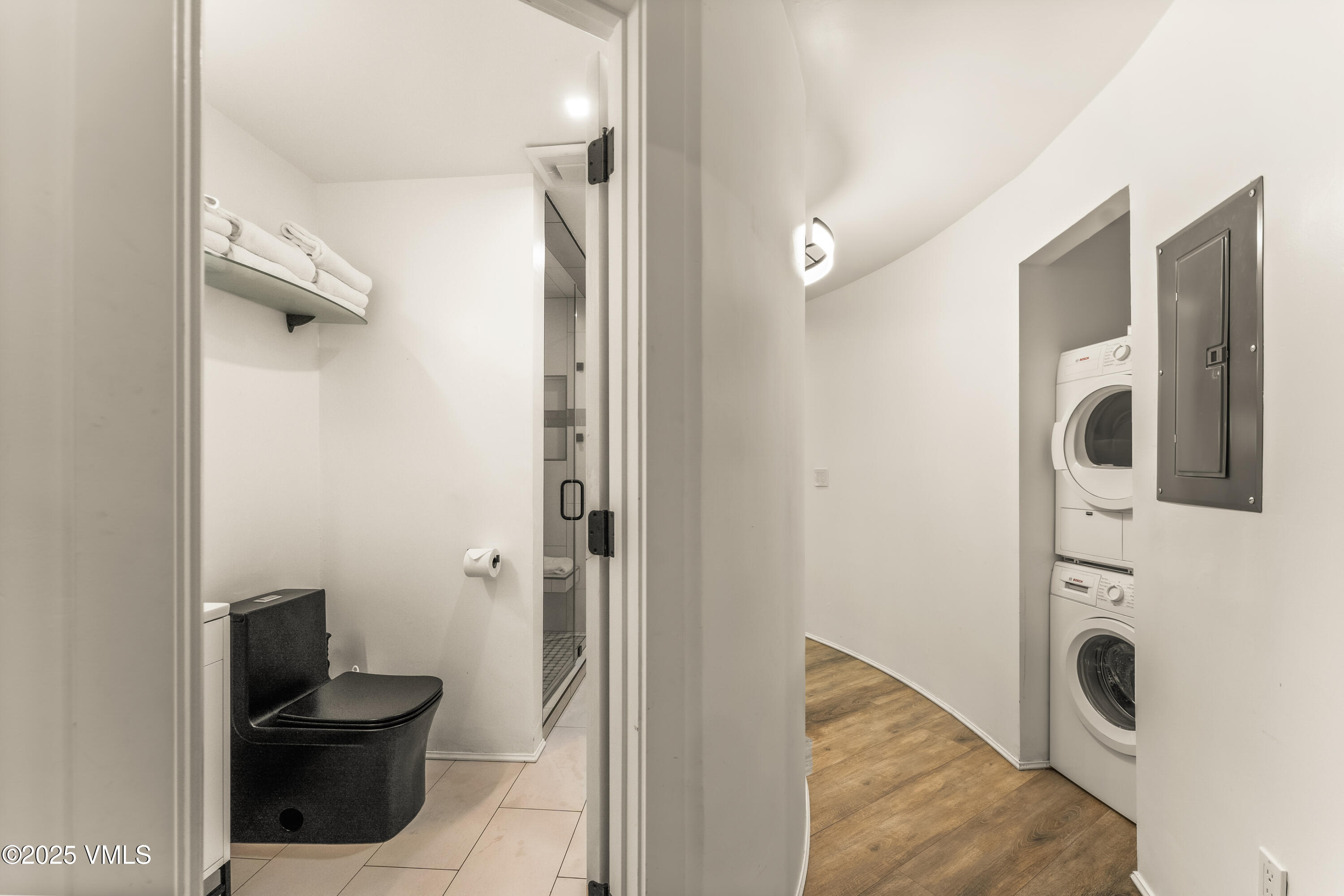 2940 Basingdale Boulevard, Unit 2 Vail, CO 81657 - Photo 14 of 28 a bathroom with a toilet and a shower