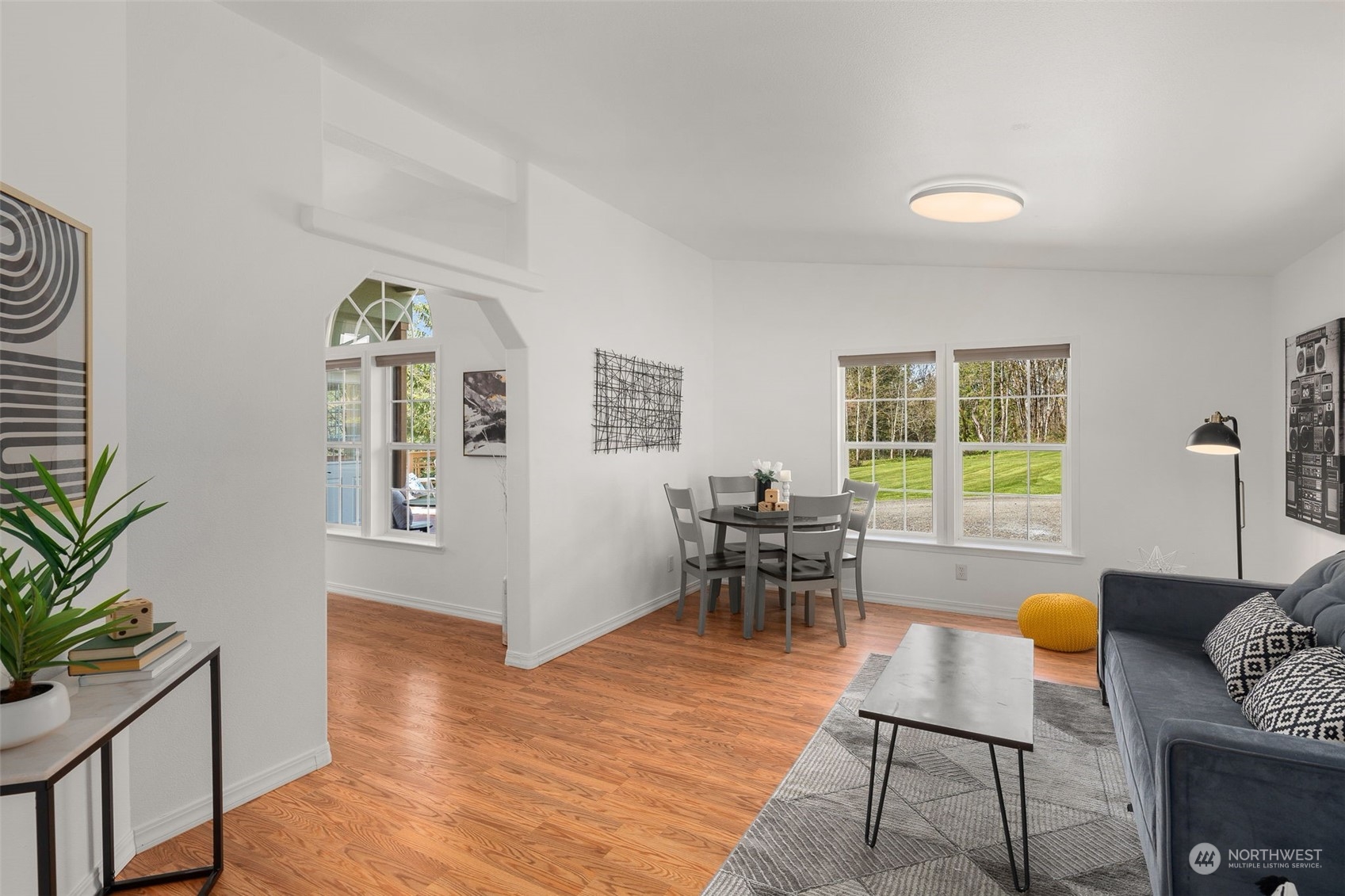 30216 Thomas Road Southeast Kent, WA 98042 - Photo 14 of 37 a living room with furniture and a window