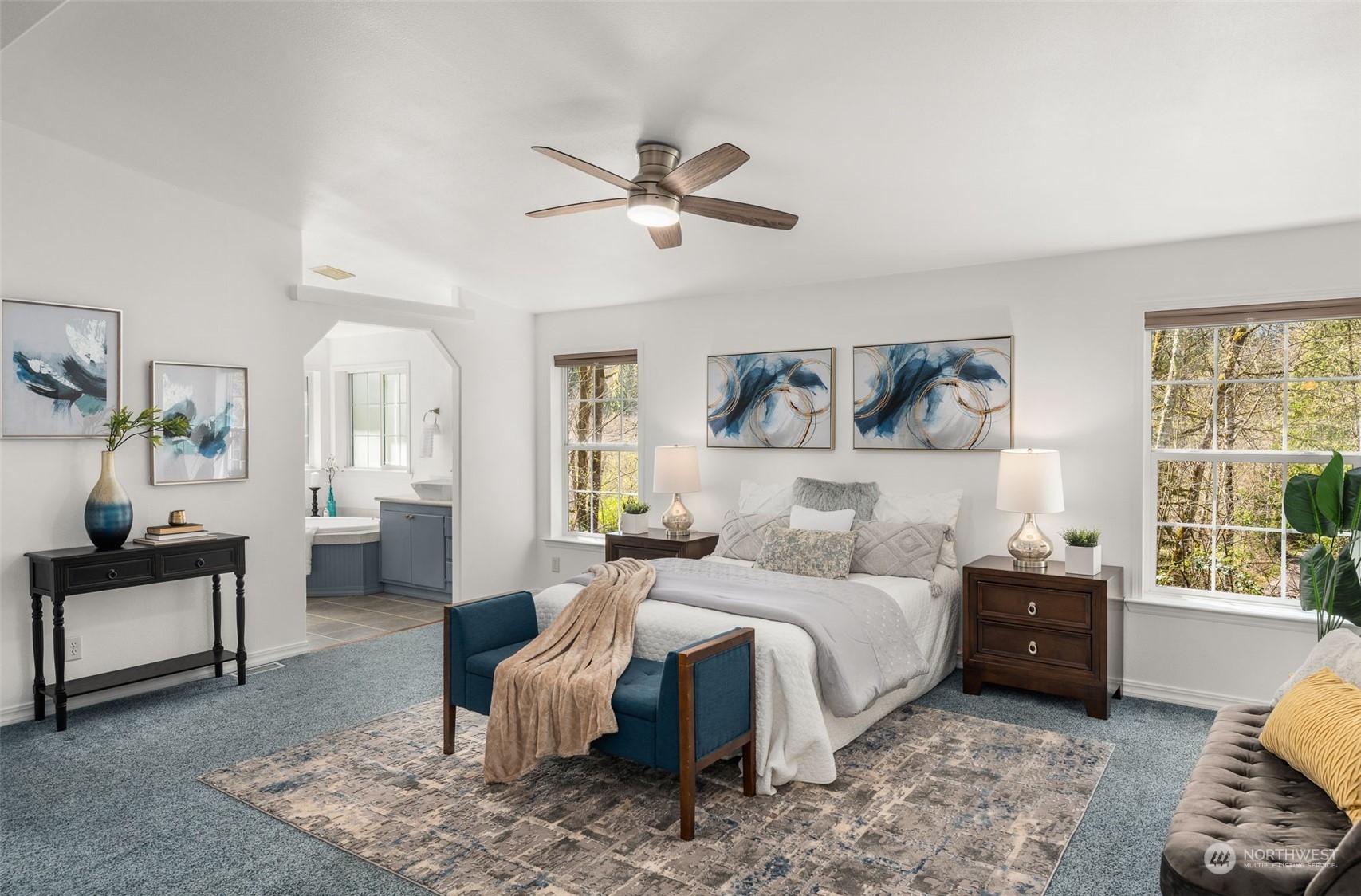 30216 Thomas Road Southeast Kent, WA 98042 - Photo 15 of 37 a bedroom with a bed a couch and a window