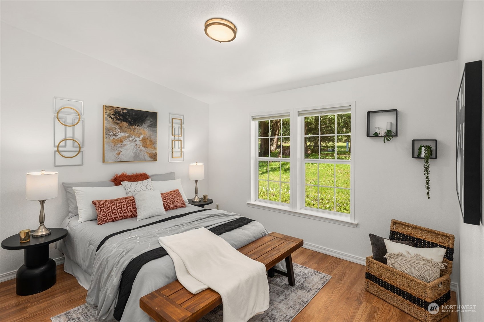 30216 Thomas Road Southeast Kent, WA 98042 - Photo 22 of 37 a bedroom with a bed and wooden floor