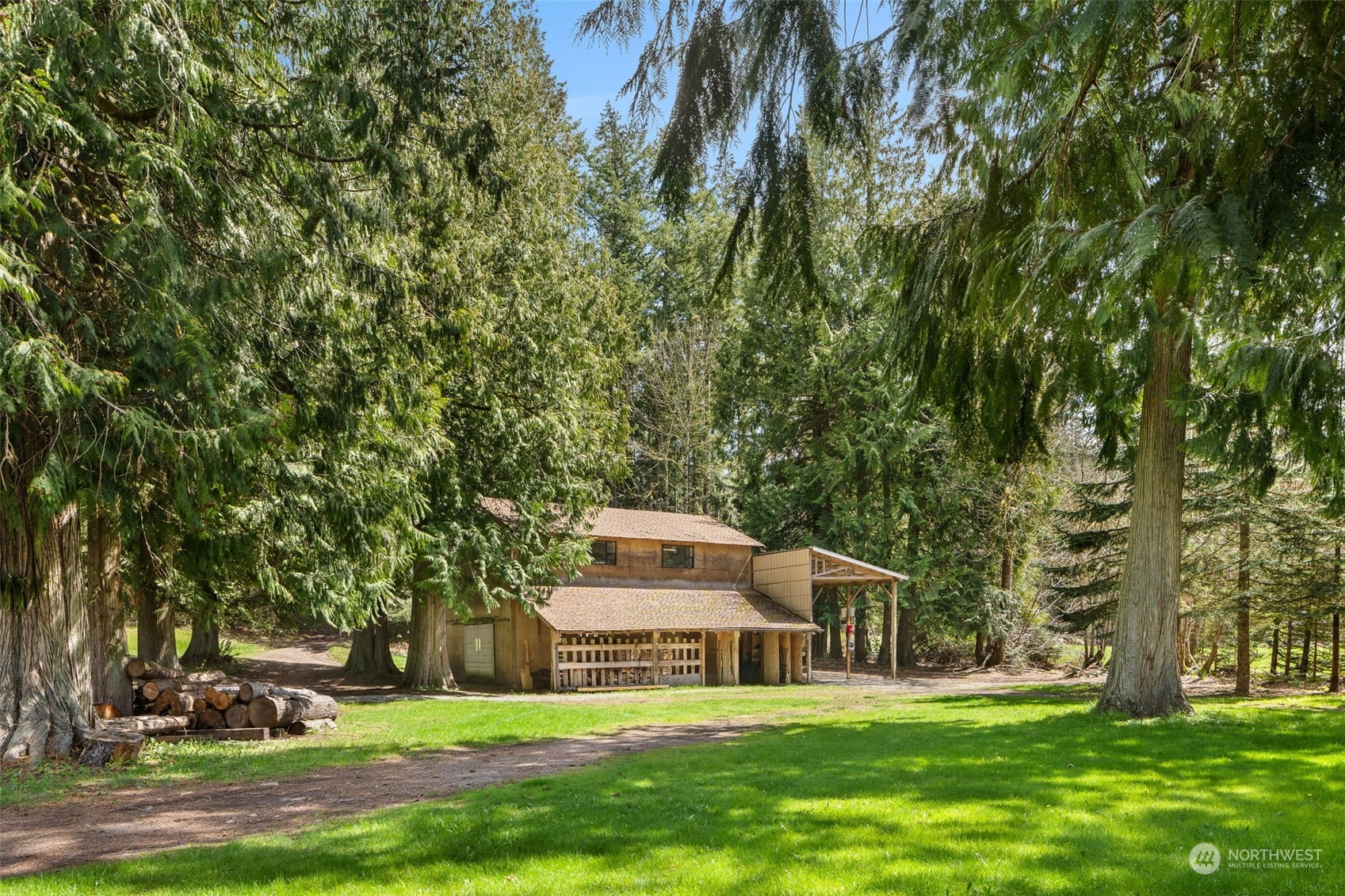 30216 Thomas Road Southeast Kent, WA 98042 - Photo 30 of 37 a view of a house with a big yard and large trees