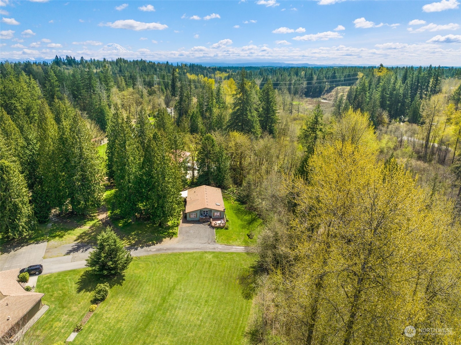 30216 Thomas Road Southeast Kent, WA 98042 - Photo 37 of 37 a view of a lake from a yard