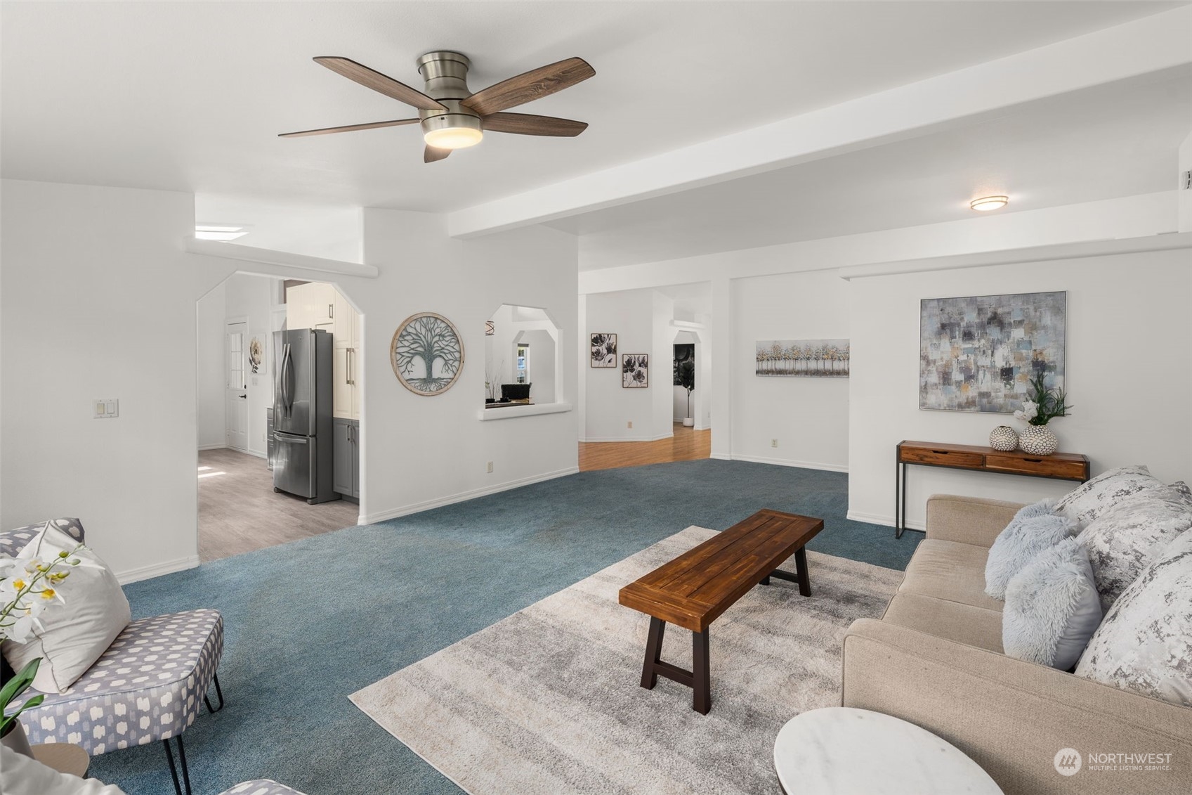 30216 Thomas Road Southeast Kent, WA 98042 - Photo 7 of 37 a living room with furniture and a rug