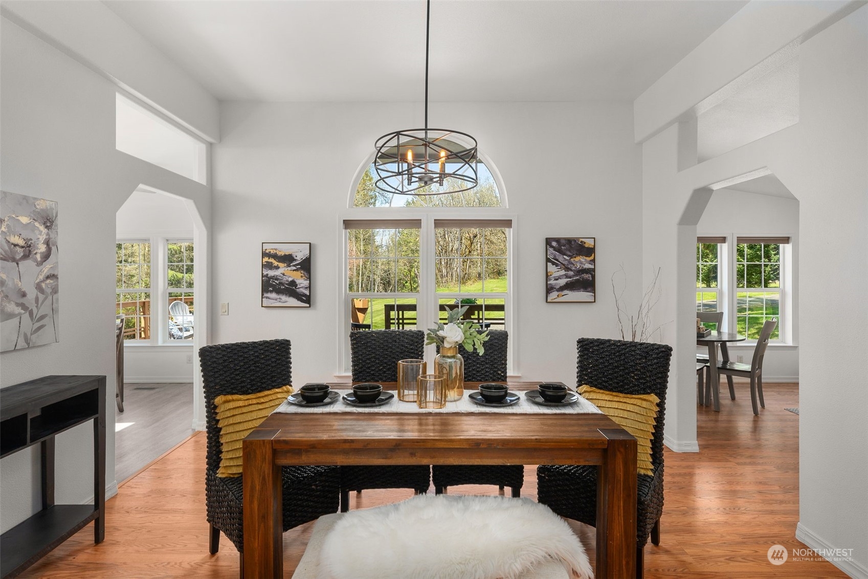 30216 Thomas Road Southeast Kent, WA 98042 - Photo 10 of 37 a view of a dining room with furniture window and wooden floor