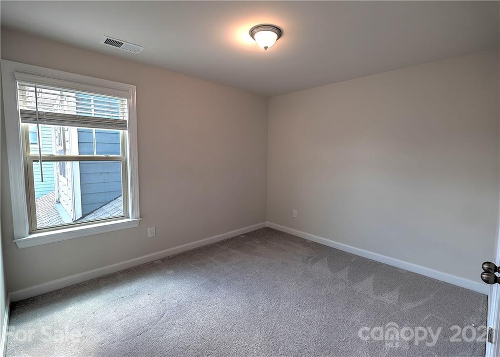 17535 Shearer Road Davidson, NC 28036 - Photo 22 of 36 an empty room with a window