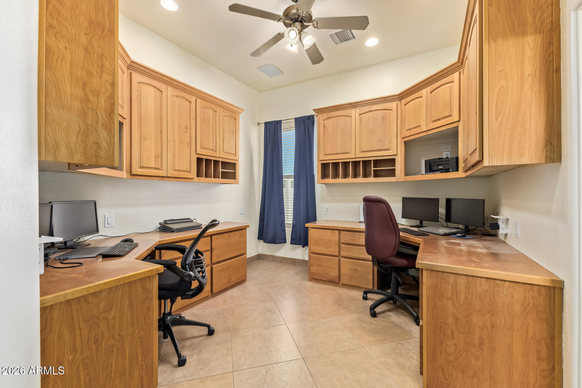 16037 West Wade Lane Goodyear, AZ 85338 - Photo 41 of 67 a work place with table and chairs