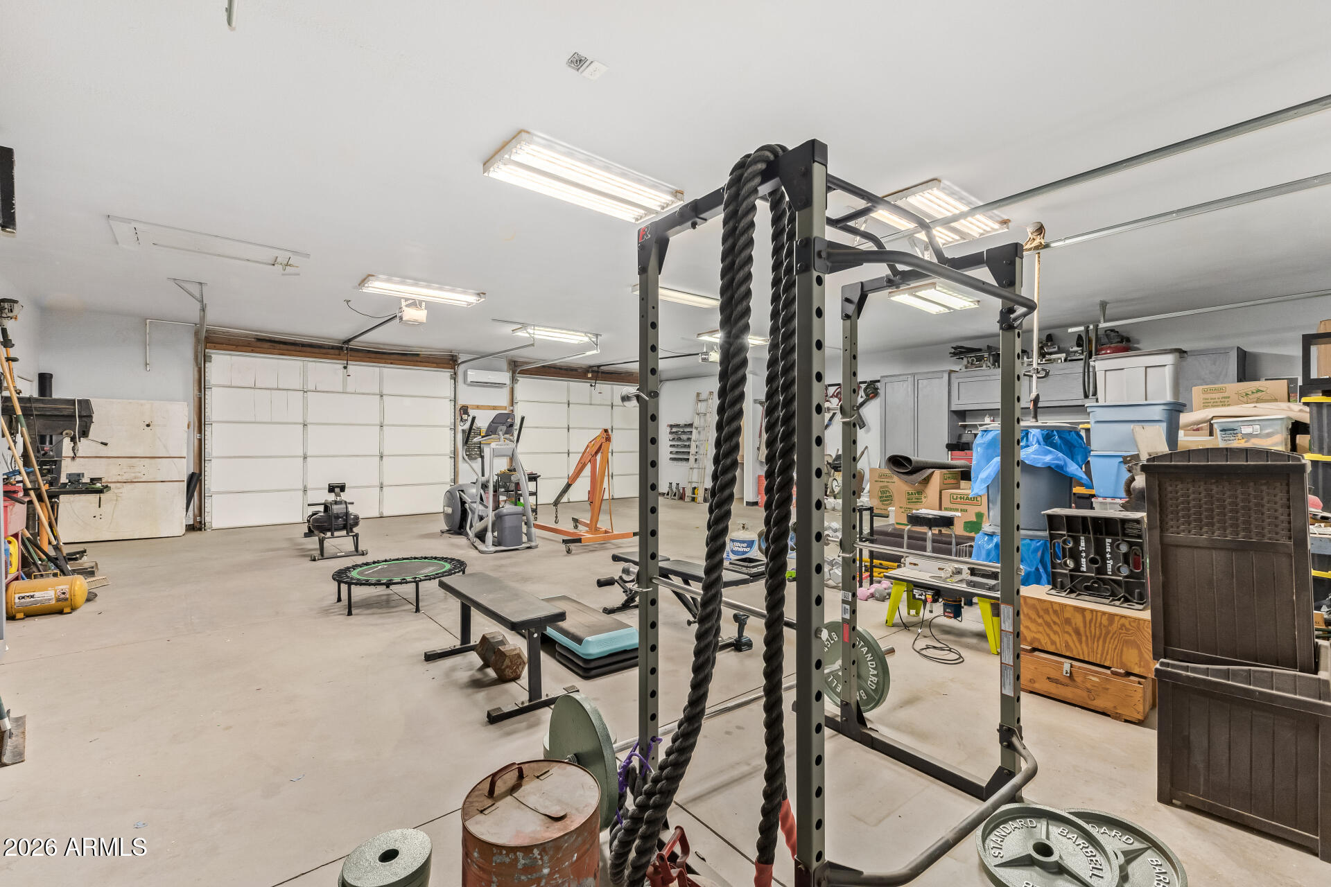 16037 West Wade Lane Goodyear, AZ 85338 - Photo 47 of 67 a view of a room with gym equipment