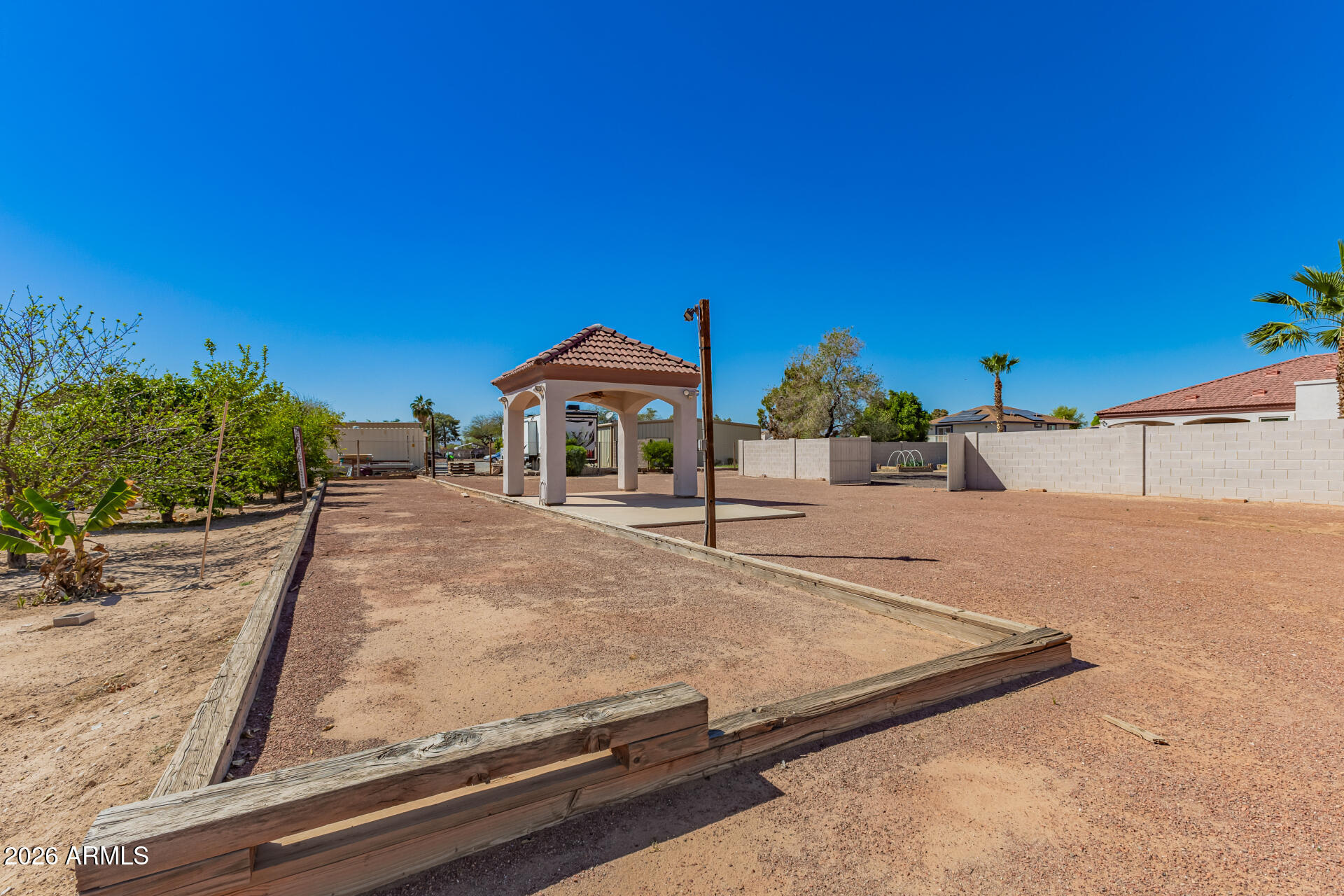 16037 West Wade Lane Goodyear, AZ 85338 - Photo 65 of 67 a view of a house with a street