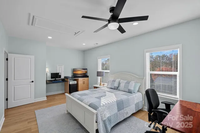 a bedroom with a bed and furniture