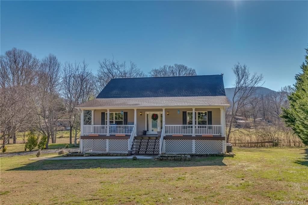54 Souther Road Fletcher, NC 28732 - Photo 1 of 40 a view of front of house with a yard