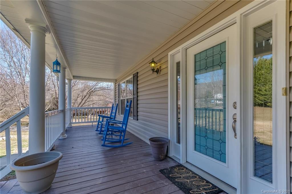 54 Souther Road Fletcher, NC 28732 - Photo 5 of 40 a view of a chairs and table in the balcony