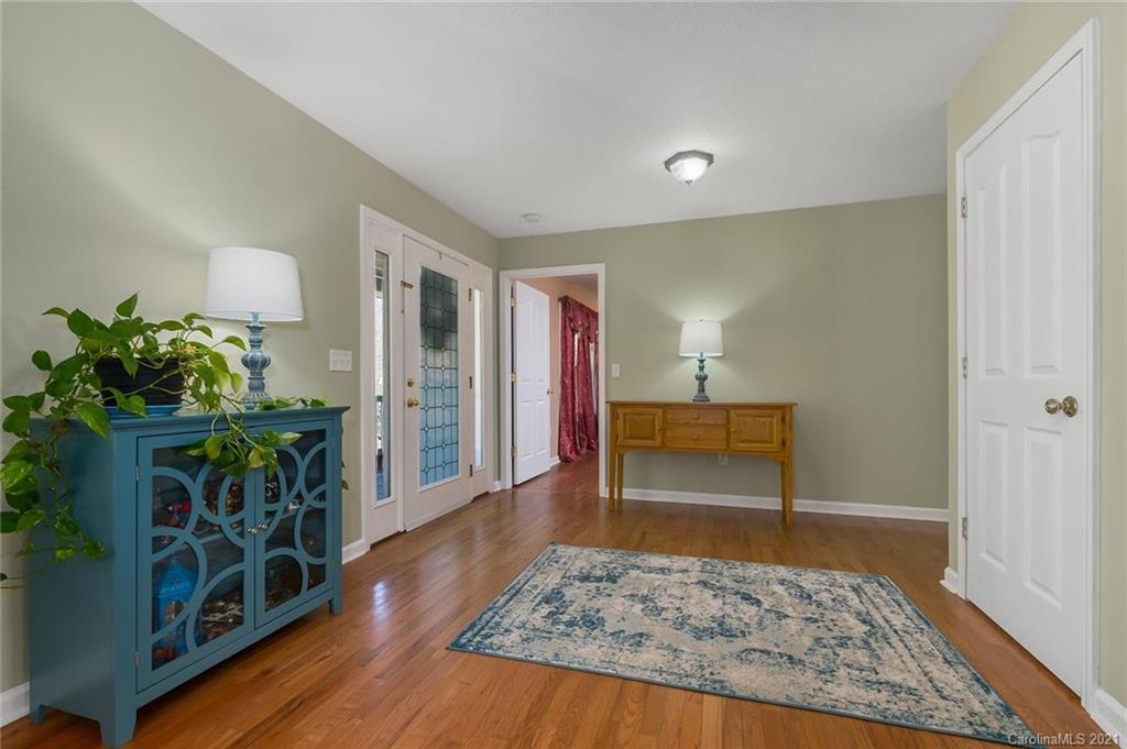 54 Souther Road Fletcher, NC 28732 - Photo 7 of 40 a living room with furniture and a potted plant