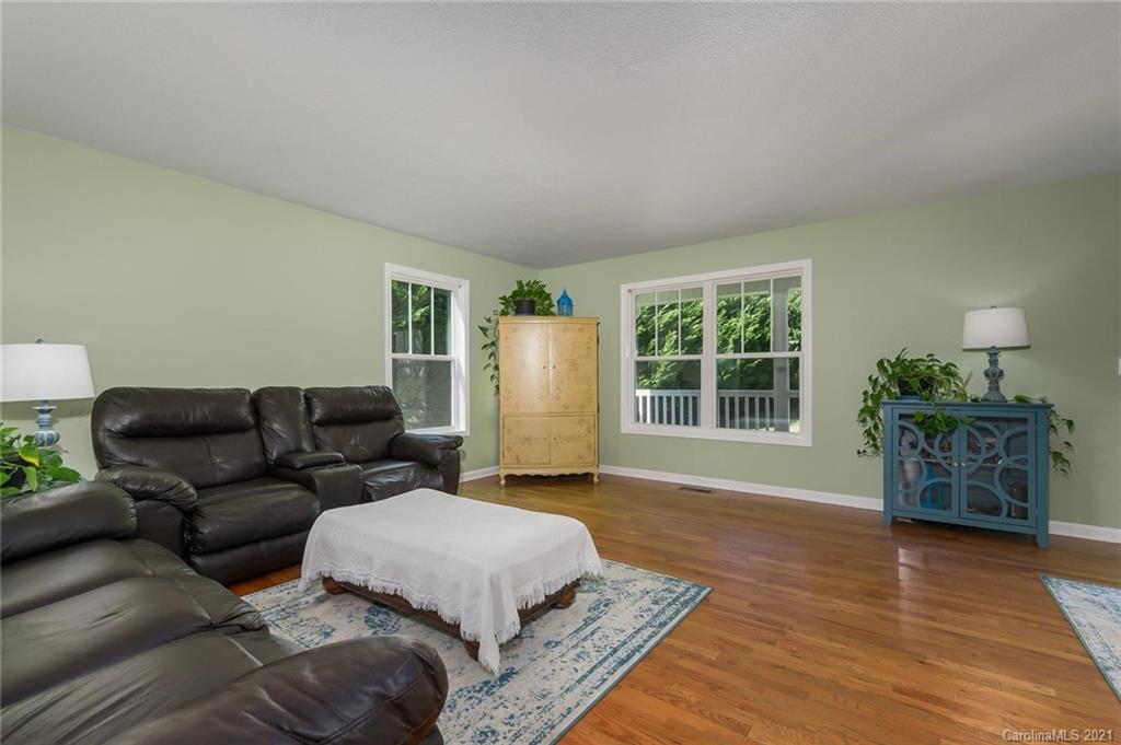 54 Souther Road Fletcher, NC 28732 - Photo 9 of 40 a living room with furniture and a window