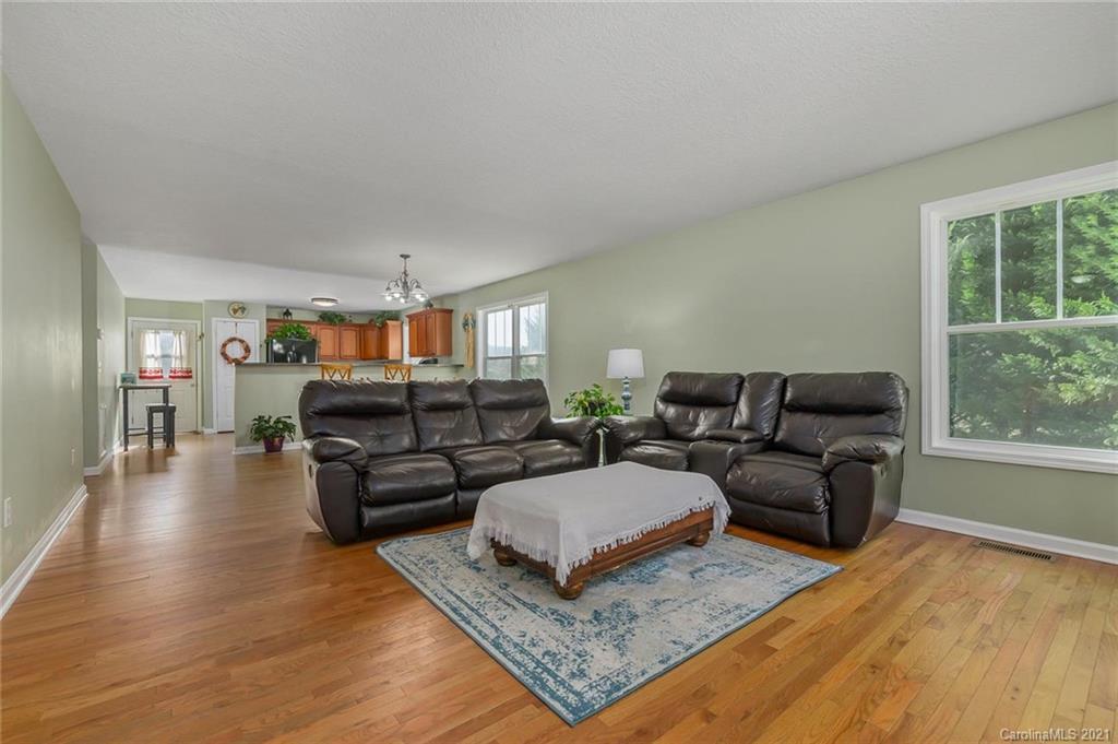 54 Souther Road Fletcher, NC 28732 - Photo 10 of 40 a living room with furniture and a couch