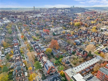 an aerial view of a city with lots of residential buildings