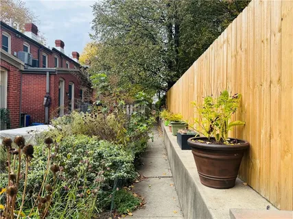 a outdoor space with a couch and chairs