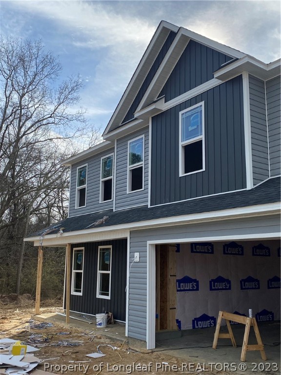 256 Crupper Lane Raeford, NC 28376 - Photo 2 of 30 a front view of a house with a yard