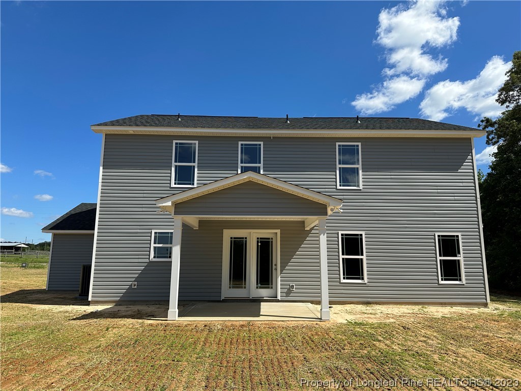 256 Crupper Lane Raeford, NC 28376 - Photo 30 of 30 a front view of a house with a yard